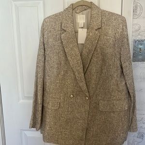 Fully lined double breasted blazer with pearl buttins